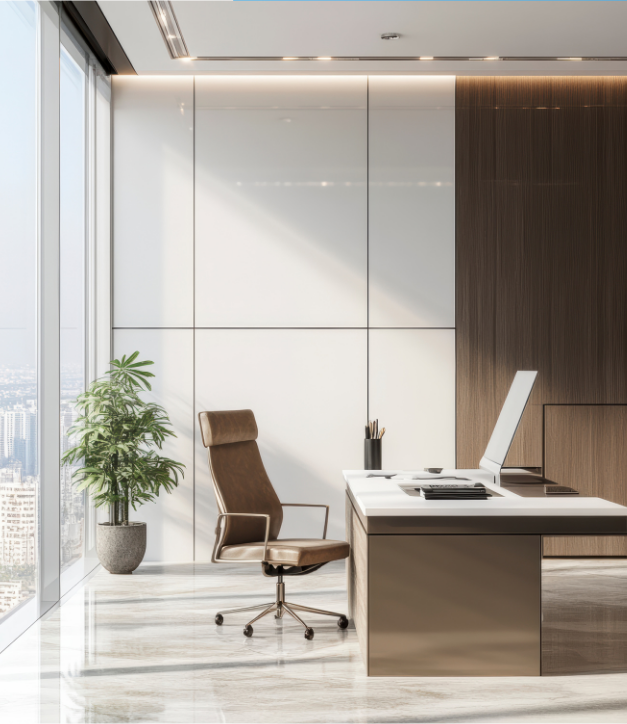 Office desk, chair and indoor plant in a modern furnished workspace.