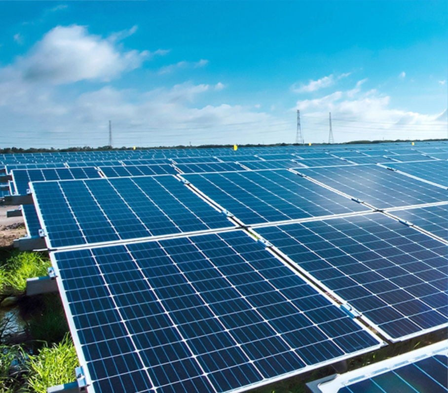 Rows of solar panels at a solar energy installation.