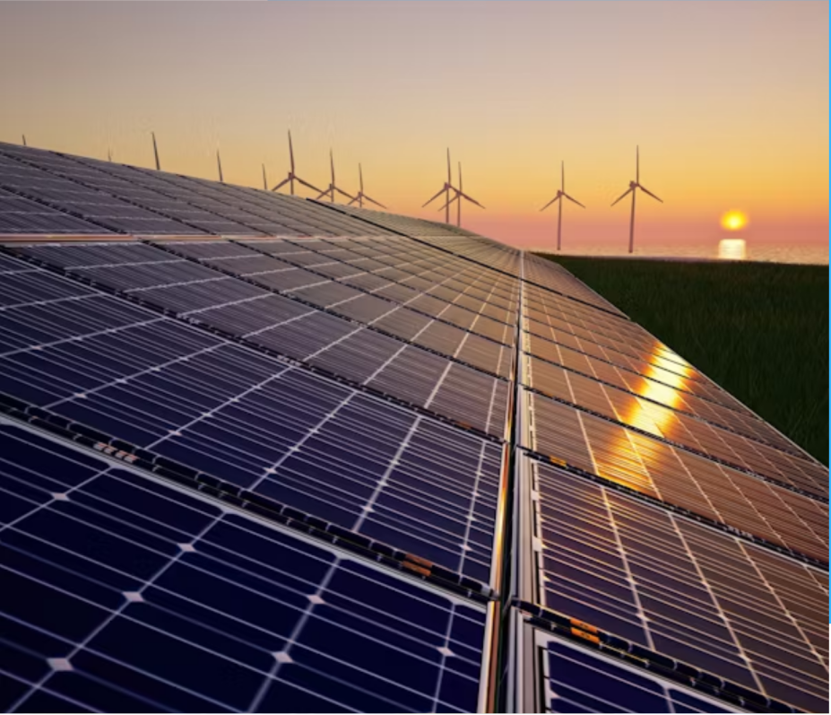Solar panels and wind turbines at sunset.
