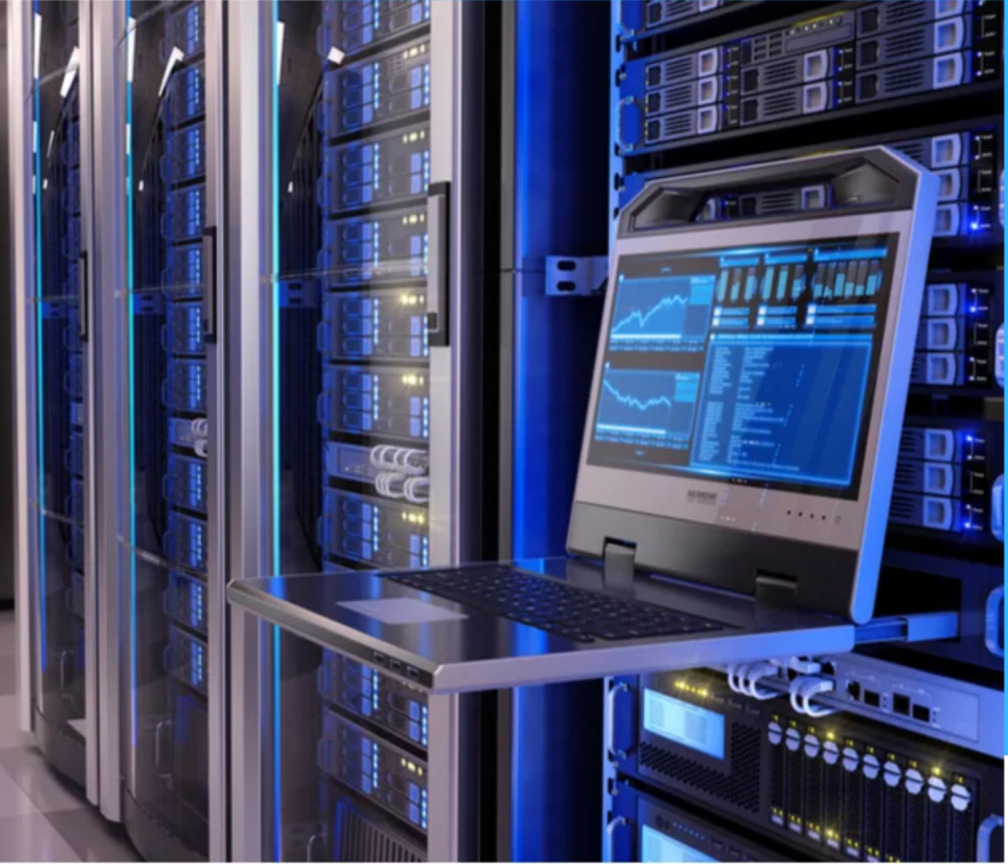 Laptop displaying monitoring information beside server racks.