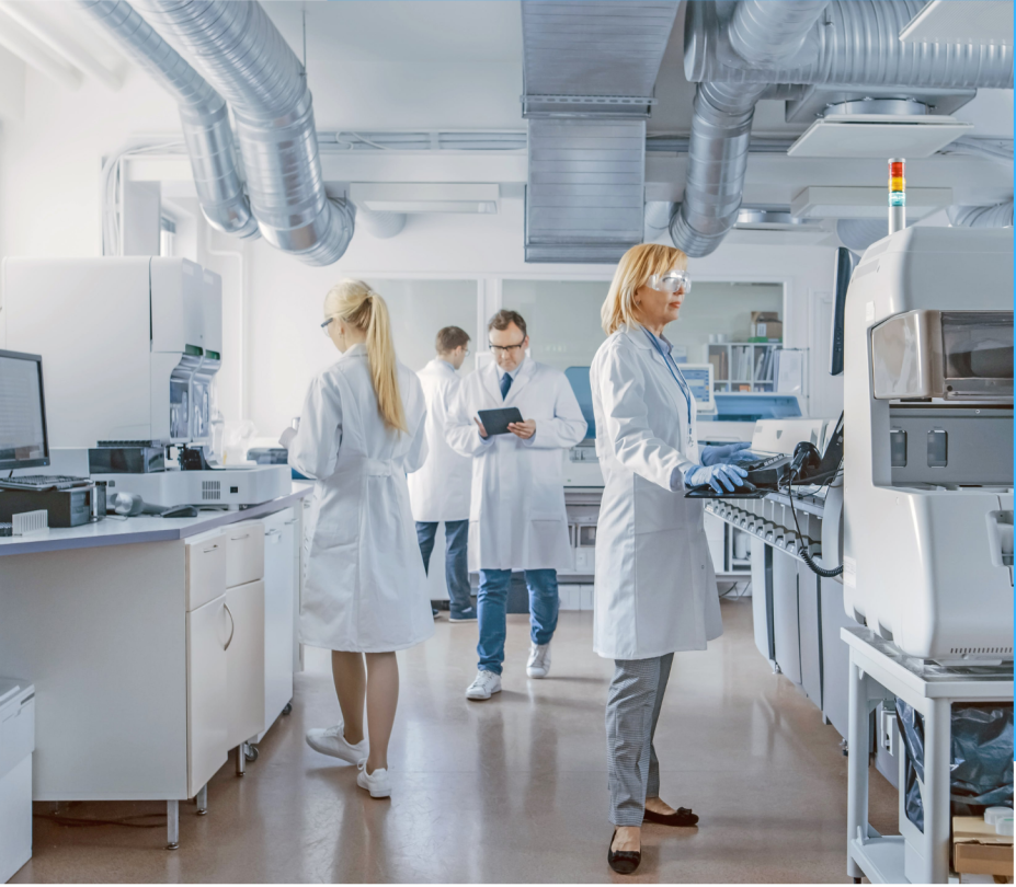 Healthcare manufacturing personnel working in a laboratory.